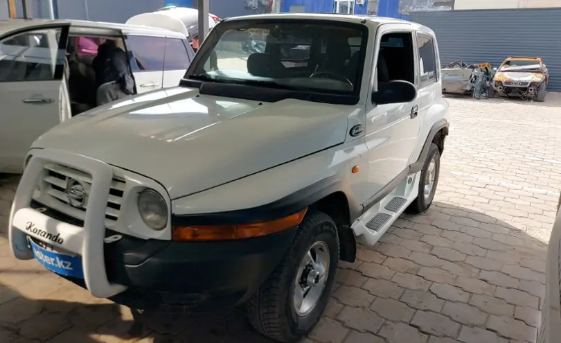 Саньенг Корандо дизель 2002 года. Корандо 2002. Korando 2002 салон.