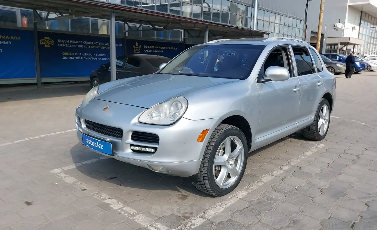 Порше кайен 2006 год. Porsche Cayenne 2006. Порше Кайен 2006 года. Каен 2006. Каен 2006 года капот.