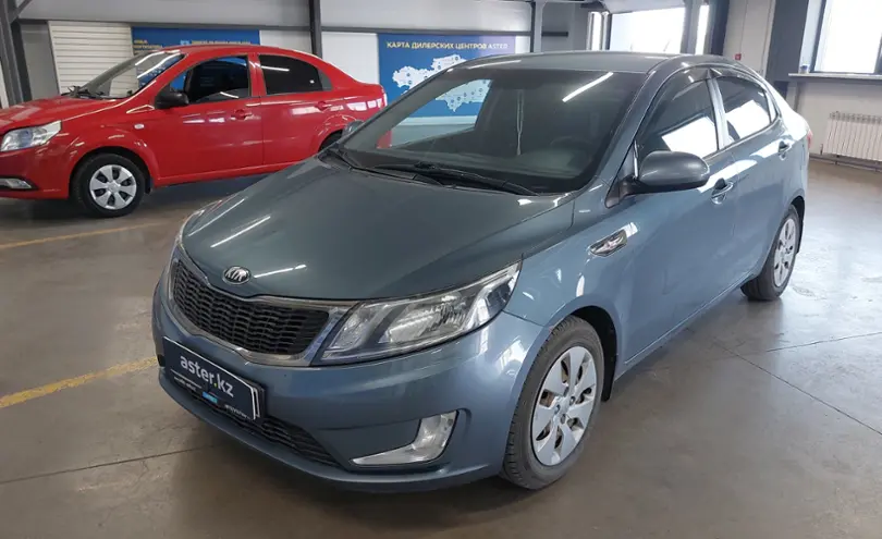 Kia Rio 2013 голубая седан