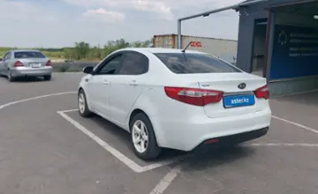 Kia Rio 2013 года за 4 400 000 тг. в Караганда фото 4