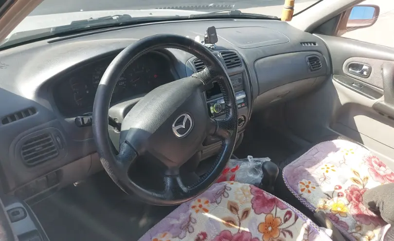 Mazda 323 2001 года за 2 500 000 тг. в Алматы фото 5