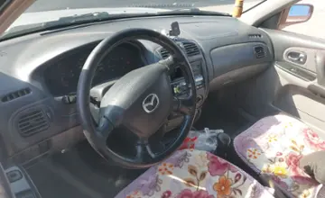Mazda 323 2001 года за 2 500 000 тг. в Алматы фото 5