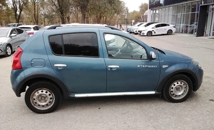 Renault Sandero 2013 года за 5 000 000 тг. в Актобе фото 4