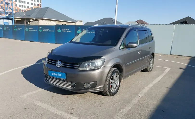 Volkswagen Touran 2011 года за 4 500 000 тг. в Шымкент