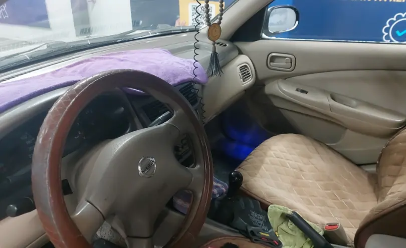 Nissan Sunny 2004 года за 1 800 000 тг. в Астана фото 5