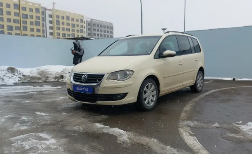 Volkswagen Touran 2010 года за 4 200 000 тг. в Алматы