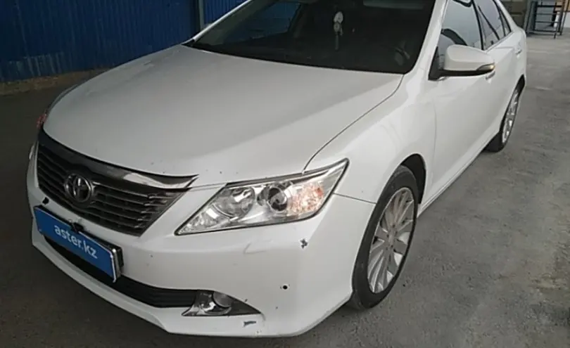 Toyota Camry 2014 года за 9 500 000 тг. в Атырау