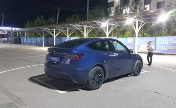 Tesla Model Y 2022 года за 19 000 000 тг. в Алматы фото 3