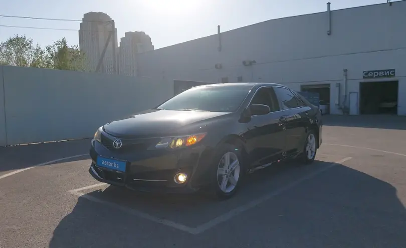 Toyota Camry 2014 года за 9 490 000 тг. в Шымкент