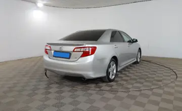 Toyota Camry 2014 года за 9 490 000 тг. в Шымкент