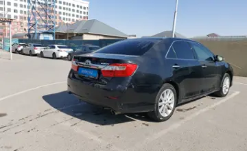 Toyota Camry 2012 года за 8 800 000 тг. в Шымкент фото 3