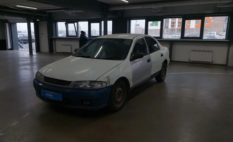 Mazda Familia 1996 года за 600 000 тг. в Астана