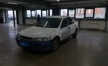 Mazda Familia 1996 года за 600 000 тг. в Астана фото 1