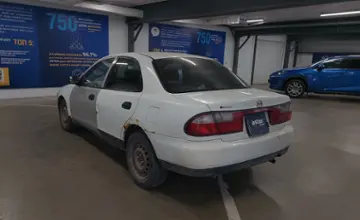 Mazda Familia 1996 года за 600 000 тг. в Астана фото 4