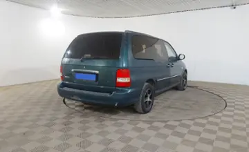 Kia Carnival 2002 года за 1 590 000 тг. в Шымкент