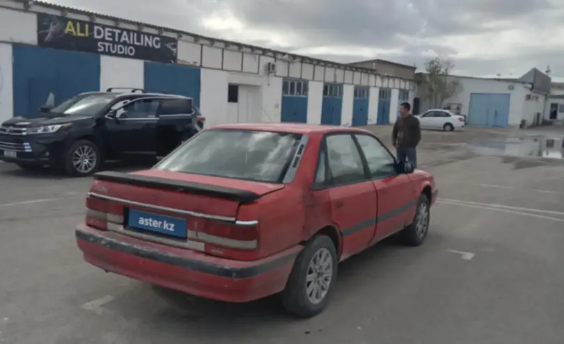 Mazda 626 1990 года за 600 000 тг. в Актау фото 5
