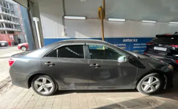 Toyota Camry 2014 года за 7 500 000 тг. в Астана фото 4
