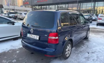 Volkswagen Touran 2008 года за 4 000 000 тг. в Астана