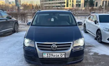 Volkswagen Touran 2008 года за 4 000 000 тг. в Астана фото 2