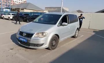 Volkswagen Touran 2009 года за 4 500 000 тг. в Шымкент фото 1