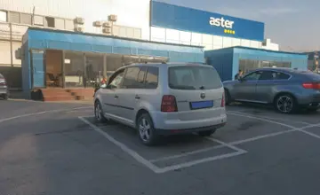 Volkswagen Touran 2007 года за 1 890 000 тг. в Алматы фото 4