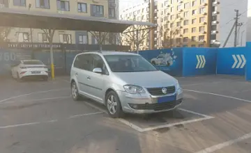 Volkswagen Touran 2007 года за 1 890 000 тг. в Алматы фото 2