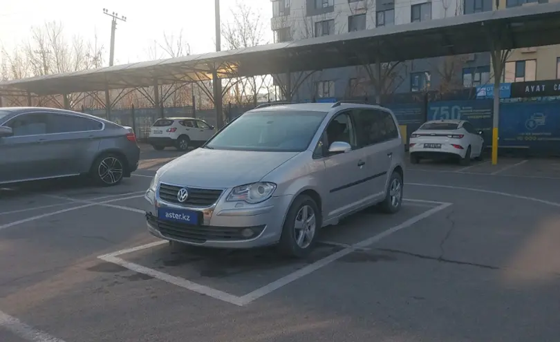 Volkswagen Touran 2007 года за 1 890 000 тг. в Алматы