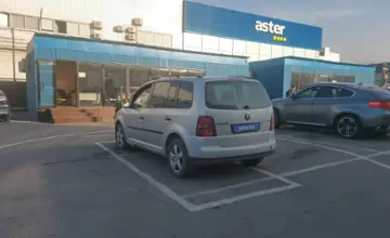 Volkswagen Touran 2007 года за 1 890 000 тг. в Алматы фото 4