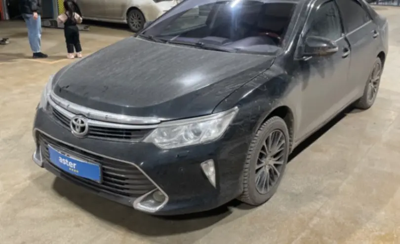 Toyota Camry 2014 года за 10 500 000 тг. в Караганда