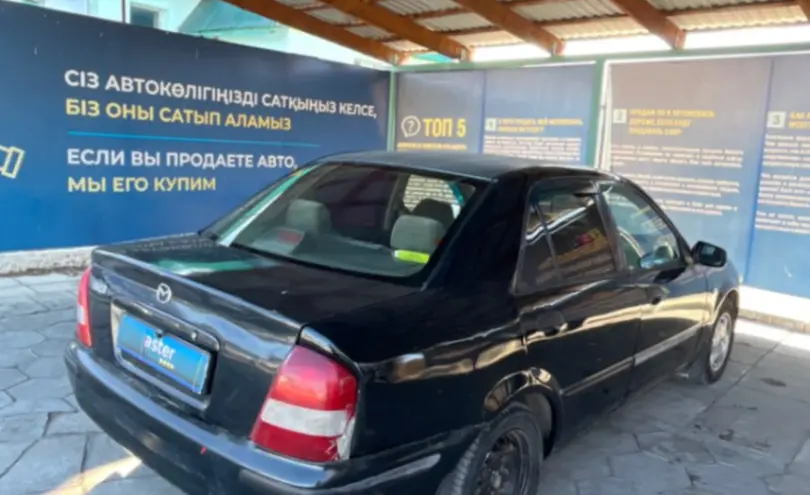 Mazda 323 1999 года за 1 300 000 тг. в Талдыкорган фото 5