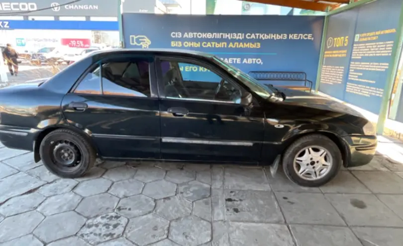 Mazda 323 1999 года за 1 300 000 тг. в Талдыкорган фото 4
