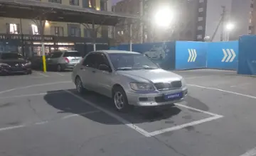 Mitsubishi Lancer 2001 года за 1 100 000 тг. в Алматы фото 2