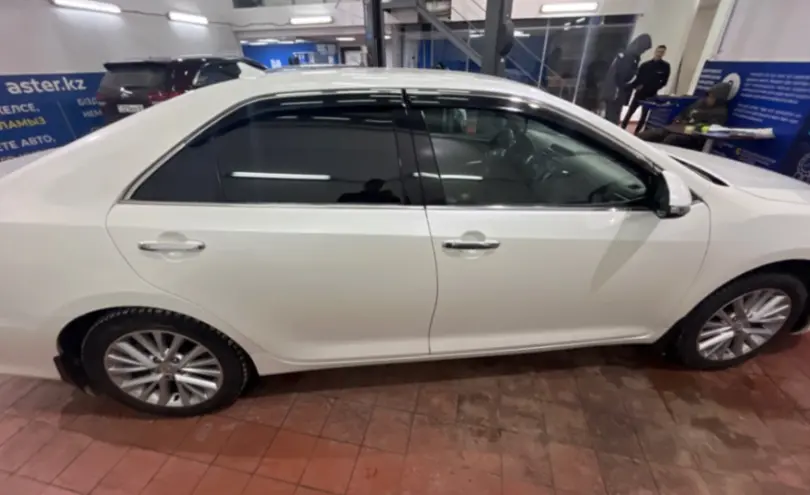 Toyota Camry 2015 года за 10 500 000 тг. в Астана фото 4
