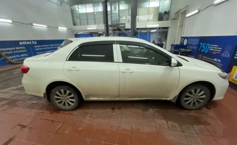 Toyota Corolla 2012 года за 6 000 000 тг. в Астана фото 4
