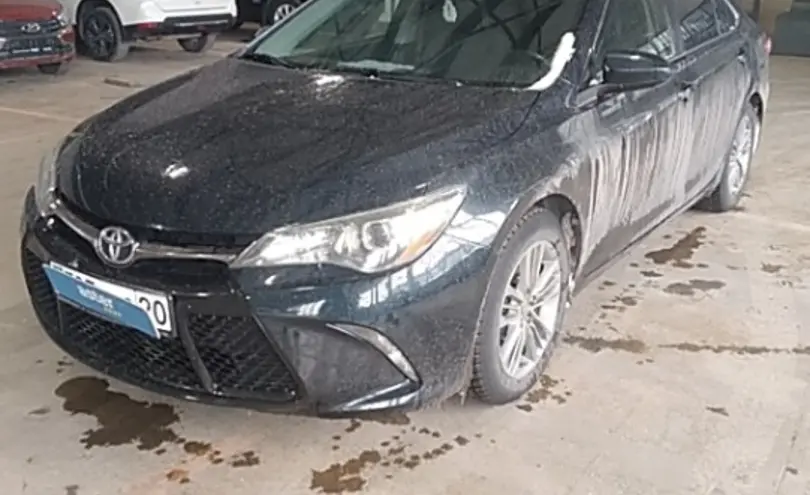 Toyota Camry 2014 года за 9 500 000 тг. в Караганда