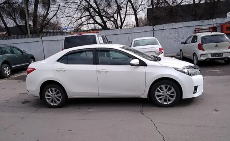 Toyota Corolla 2014 года за 6 800 000 тг. в Алматы фото 4