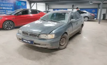 Toyota Carina 1997 года за 1 100 000 тг. в Астана фото 1