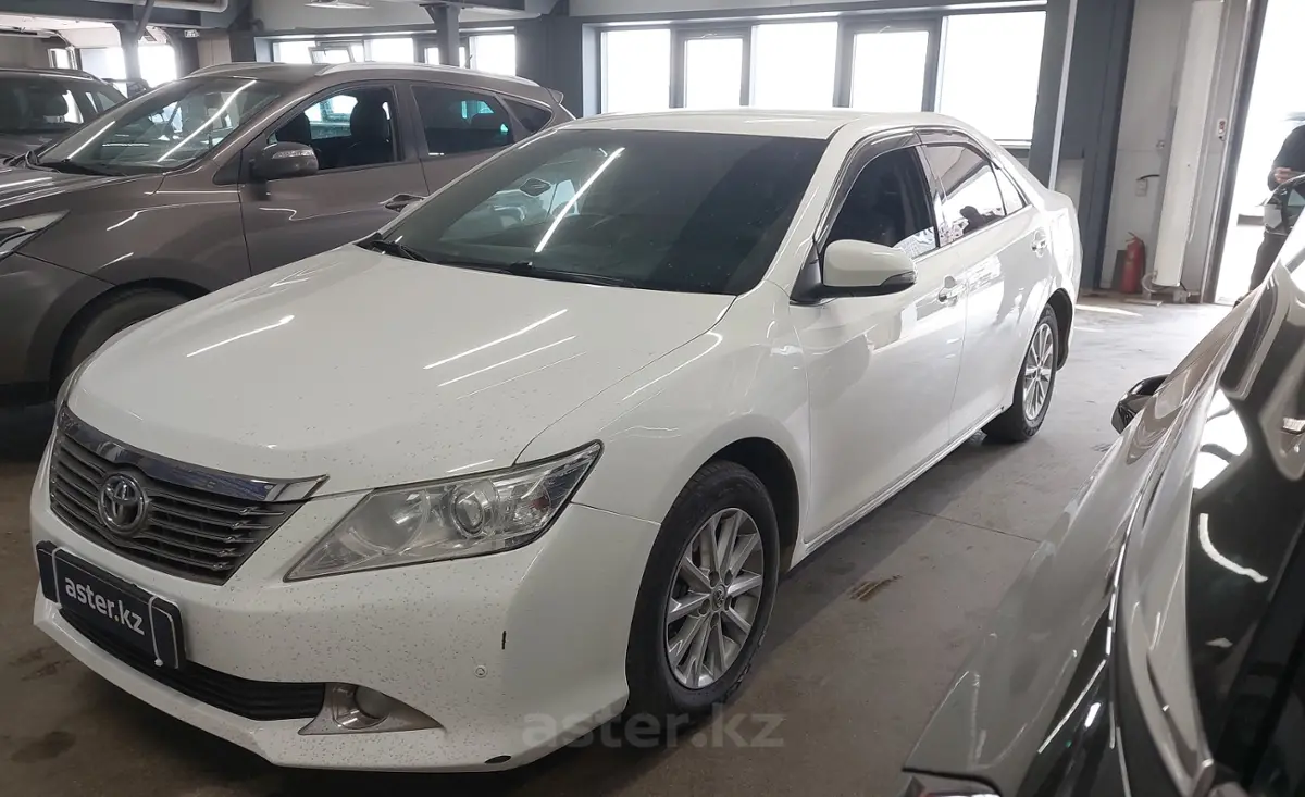 Toyota Camry 2014 года за 9 500 000 тг. в Астана