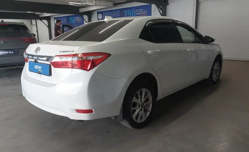 Toyota Corolla 2013 года за 6 800 000 тг. в Астана фото 4