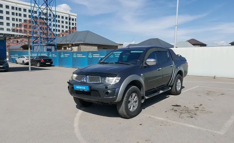 Mitsubishi L200 2013 года за 8 500 000 тг. в Шымкент
