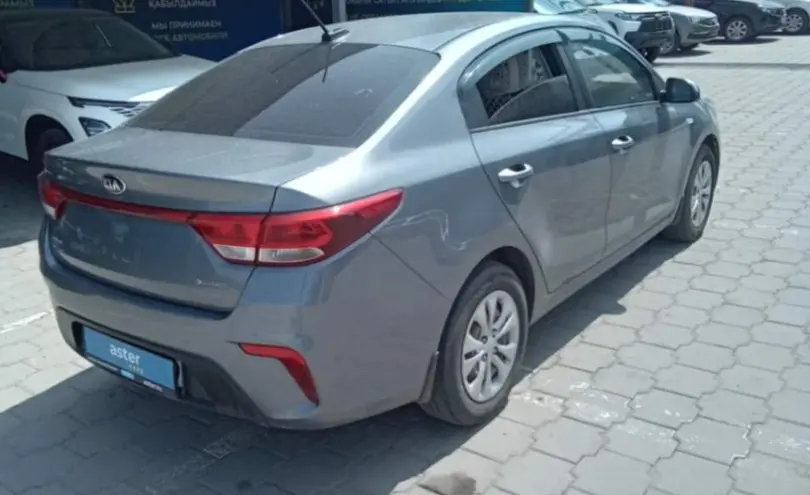 Kia Rio 2018 года за 7 500 000 тг. в Караганда фото 5