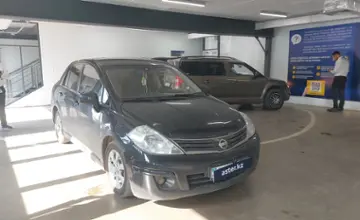 Nissan Tiida 2010 года за 4 500 000 тг. в Астана фото 2