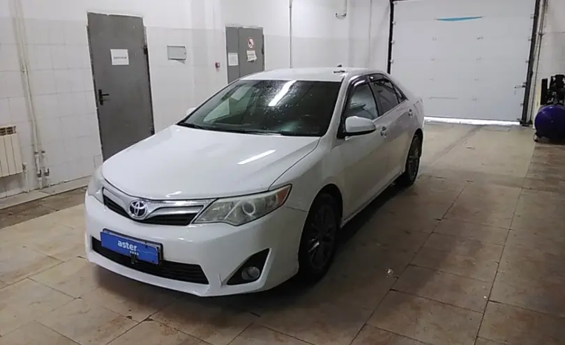 Toyota Camry 2014 года за 8 900 000 тг. в Актобе