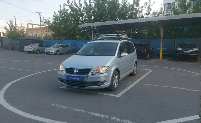 Volkswagen Touran 2009 года за 4 500 000 тг. в Алматы