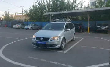 Volkswagen Touran 2009 года за 4 500 000 тг. в Алматы фото 1