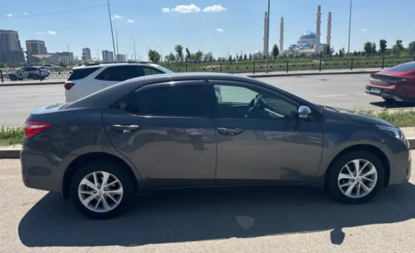 Toyota Corolla 2014 года за 6 700 000 тг. в Астана фото 4