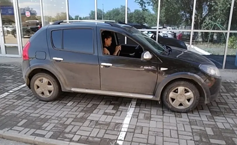 Renault Sandero 2013 года за 3 750 000 тг. в Актобе фото 4