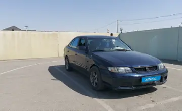 Mazda 626 1998 года за 1 500 000 тг. в Шымкент фото 2