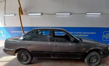 Mazda 626 1991 года за 800 000 тг. в Астана фото 4