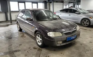 Mazda 323 1999 года за 2 000 000 тг. в Астана фото 2